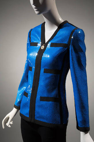 Royal blue sequined evening jacket with black trim and zipper front with double C Chanel logo z…