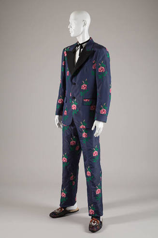 Man’s blue formal suit with allover woven red, pink and green stemmed roses, jacket with black …