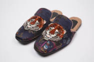 Pair of blue silk brocade evening slippers of Asian motifs and Donald Duck with orange, white a…