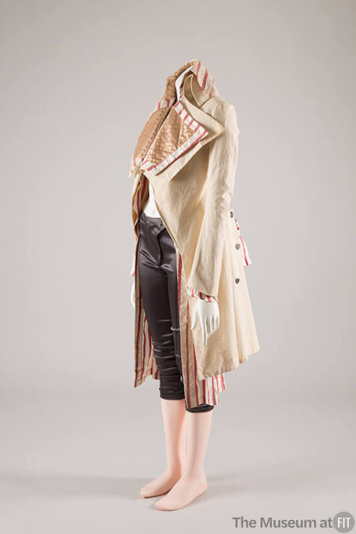 Muslin jacket with oversize collar and lapels lined in red and white striped and floral jacquar…