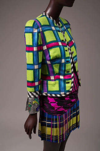 Suit of bright green, pink, purple and blue plaid jacket with pink and black abstract pink top …