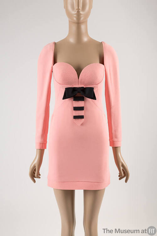 Pink long sleeve mini dress with sweetheart neckline, padded bra bodice and black blow with bla…