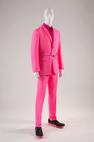 Man’s neon pink suit with belted single breasted jacket, matching slim pants, fuchsia pink shir…