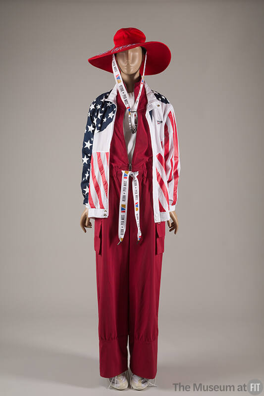 Red, white and blue American flag pattern jacket over red cargo pocket jumpsuit with red wide b…