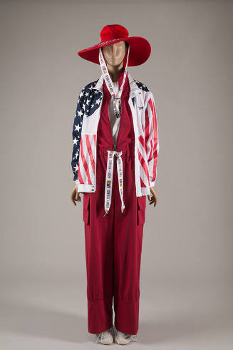Red, white and blue American flag pattern jacket over red cargo pocket jumpsuit with red wide b…