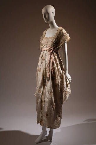 Pink silk brocaded floral ankle-length dress, off-white lace shoulders with ribbon trim, pink s…