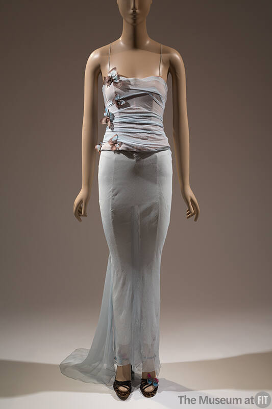 Pale blue evening dress with spaghetti straps, appliqued butterflies throughout boned bodice an…
