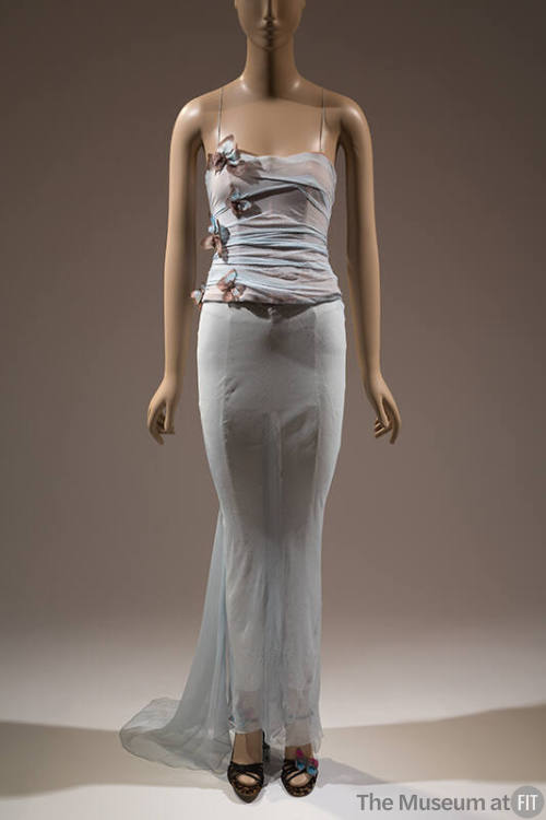 Pale blue evening dress with spaghetti straps, appliqued butterflies throughout boned bodice an…