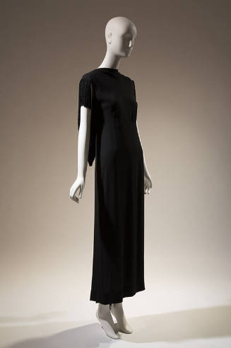 Long black evening dress with high cowl front bodice