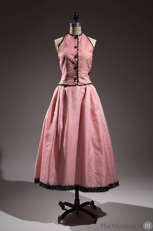 Sleeveless pink and white stripe button front vest and full skirt with black trim 
