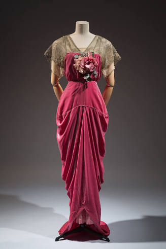 Dark pink floor length evening dress with gold metallic short sleeves, pink flowers on center b…