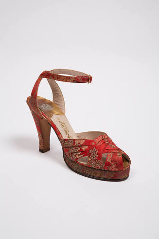 Red platform evening sandal with tan Chinese inspired brocade, vamp of three interlaced bands a…