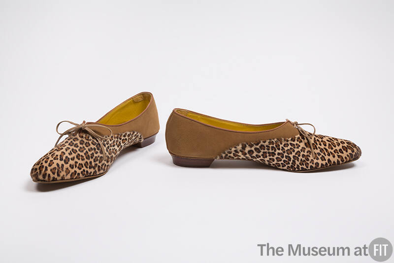 Pair of tan, leapord print flats with an oval toe