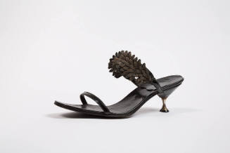 Black mule sandal with leaf spray and small waisted metal heel