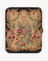 Symmetrical floral design in petit point