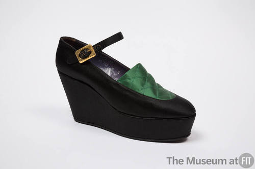 Platform wedge bar shoe with green satin quilted apron and goldtone buckle on strap