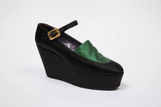 Platform wedge bar shoe with green satin quilted apron and goldtone buckle on strap