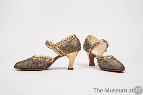 Pair of silver metallic brocade D'Orsay shoes with gold and silver heel and trim