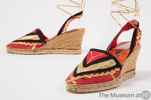 Red, black, gold wedge heel espadrilles with gold string ankle ties