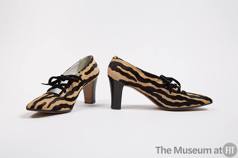 Black velvet lace up pump in tan and black zebra printed calf hair, black high heel