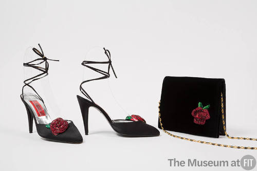 Black high heel ankle strap shoes with red rhinestone rose applique and matching handbag with g…
