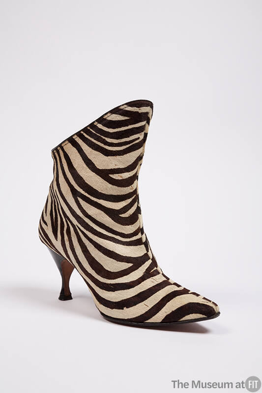 Brown and white zebra printed calfskin ankle boots with curved high heel