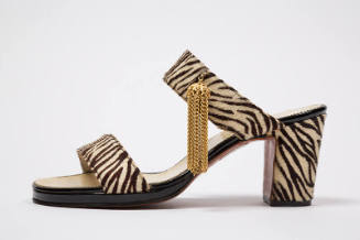 Ivory and brown zebra stripe printed calf skin two strap mule sandal with gold tassel and chunk…