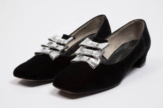 Black velvet shoes with three silver lamé bows, low heels