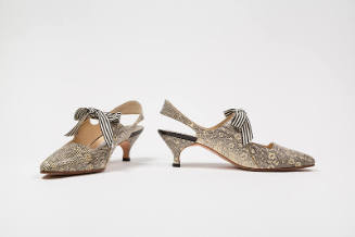 Pair of black and cream lizard sling back shoes with instep tie of black and white striped ribb…
