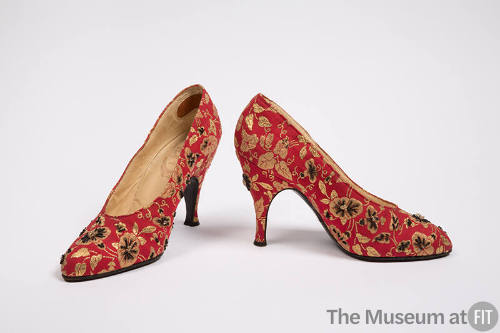 Pair of red pumps with gold floral brocade, black and gold bead embroidery, gold insole and hig…