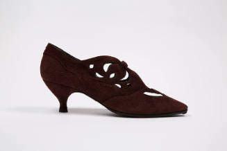 Dark red brown shoe with cut work at sides and low heel