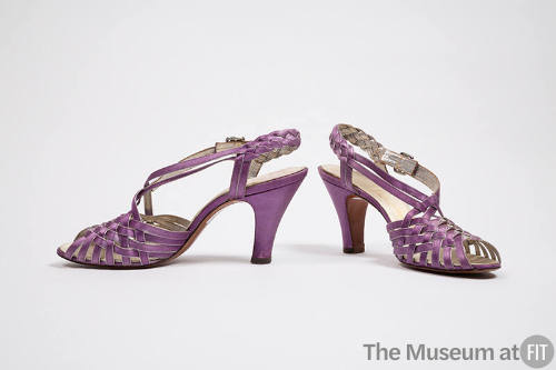 Pair of lavender high heel slingback sandals with braided vamp and rhinestone ankle buckle