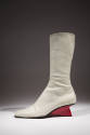 White leather mid-calf boot with red triangular heel