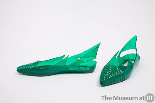 Green plastic pointy toe sling back sandals