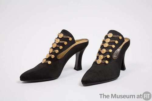 Black evening high heel mules with extended pointed toe in rhinestones and gold metal embossed …