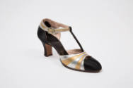 Alternate view of gold and silver metallic shoes with black toe, T-strap and heels