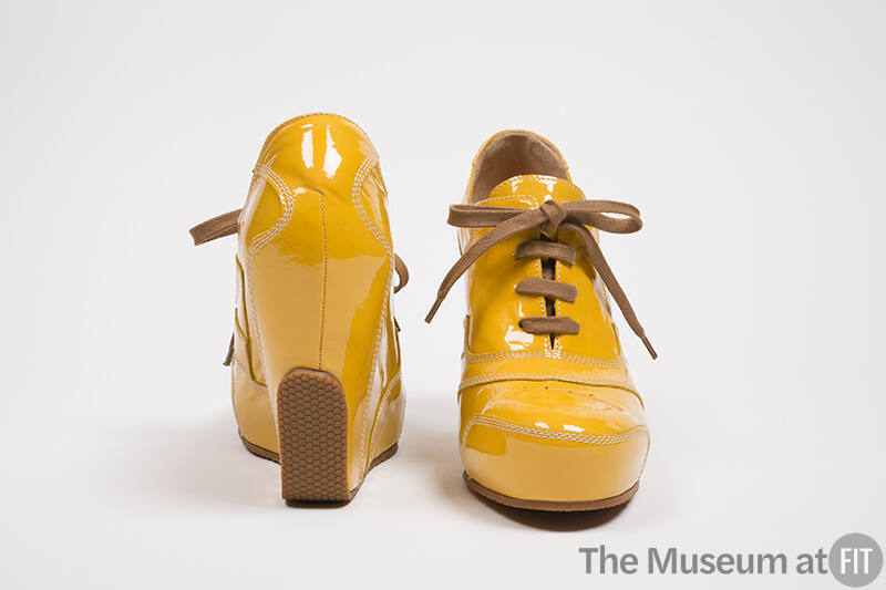 Yellow patent leather wedge heel lace up shoes 