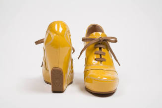 Yellow patent leather wedge heel lace up shoes 