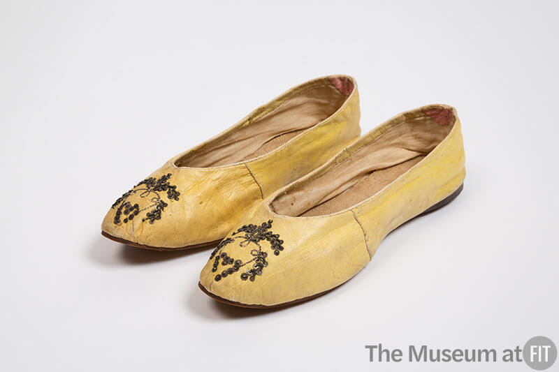 Pair of yellow flat leather slippers with gold gilt leaf embroidery and metal sequins at vamp