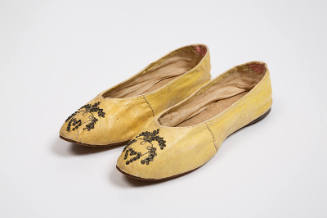 Pair of yellow flat leather slippers with gold gilt leaf embroidery and metal sequins at vamp