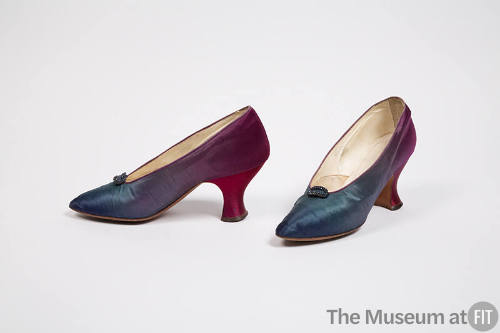 Pair of blue/purple ombre court style evening pumps with tiny oval buckle ornament of blue ston…