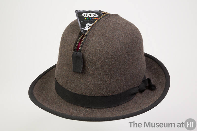 Man’s light brown charcoal wool hat with short brim, black grosgrain ribbon hat band and high c…