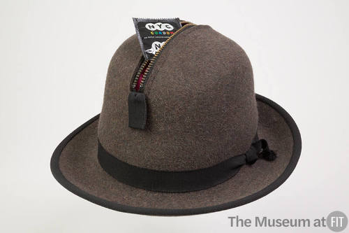 Man’s light brown charcoal wool hat with short brim, black grosgrain ribbon hat band and high c…