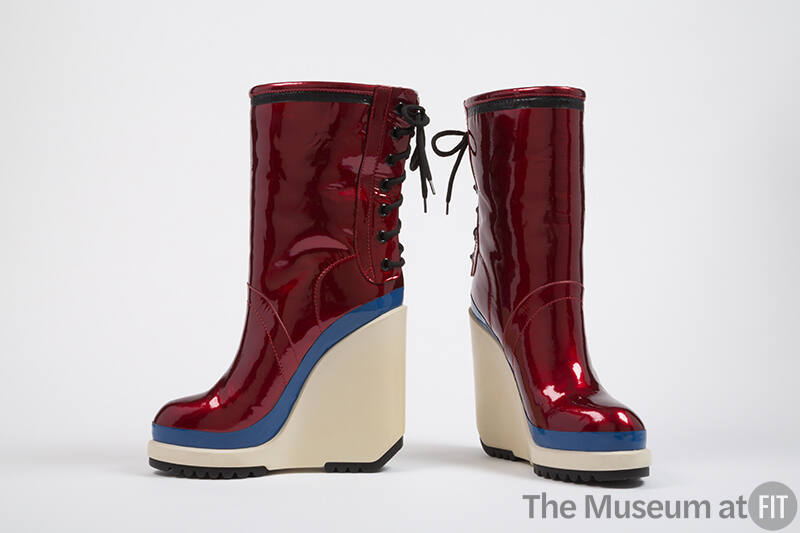 Red boots with white high platform wedge, royal blue and black band trims 