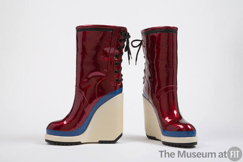 Red boots with white high platform wedge, royal blue and black band trims 