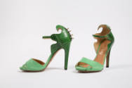 Green snakeskin high heel ankle strap sandals with swirling top edge and light green front stra…