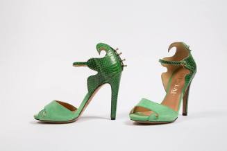 Green snakeskin high heel ankle strap sandals with swirling top edge and light green front stra…