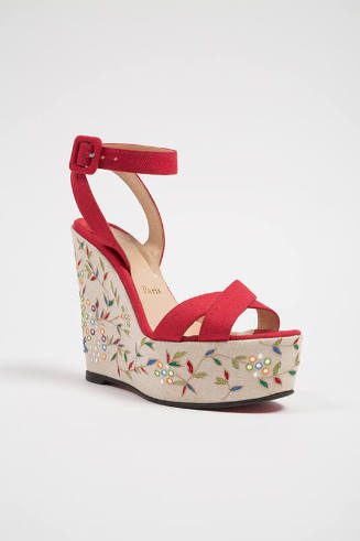 Red platform sandal with wrap ankle strap and beige platform embroidered in multicolor leaf and…