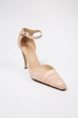 Pink high heel evening shoe with shirred beige net overlay, pointed toe, ankle strap and gold C…