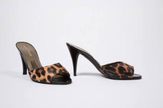 Leopard print slide sandals with high black heels